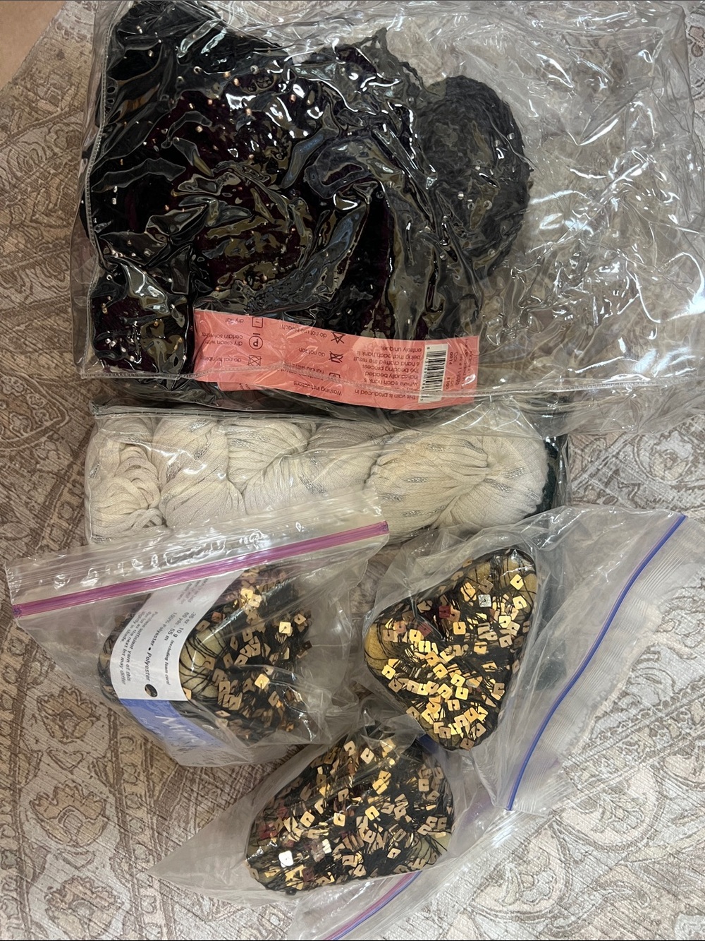 Black Sequin Appliqués with Cream Yarn for Fiber Art Projects